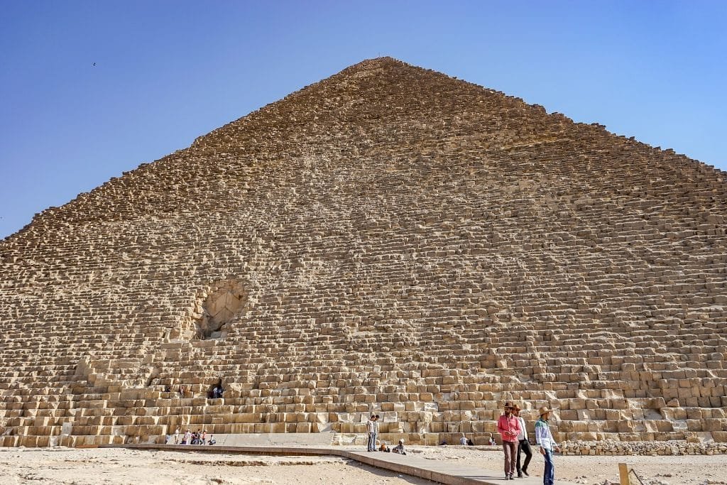 Visitors beside the Great Pyramid of Giza