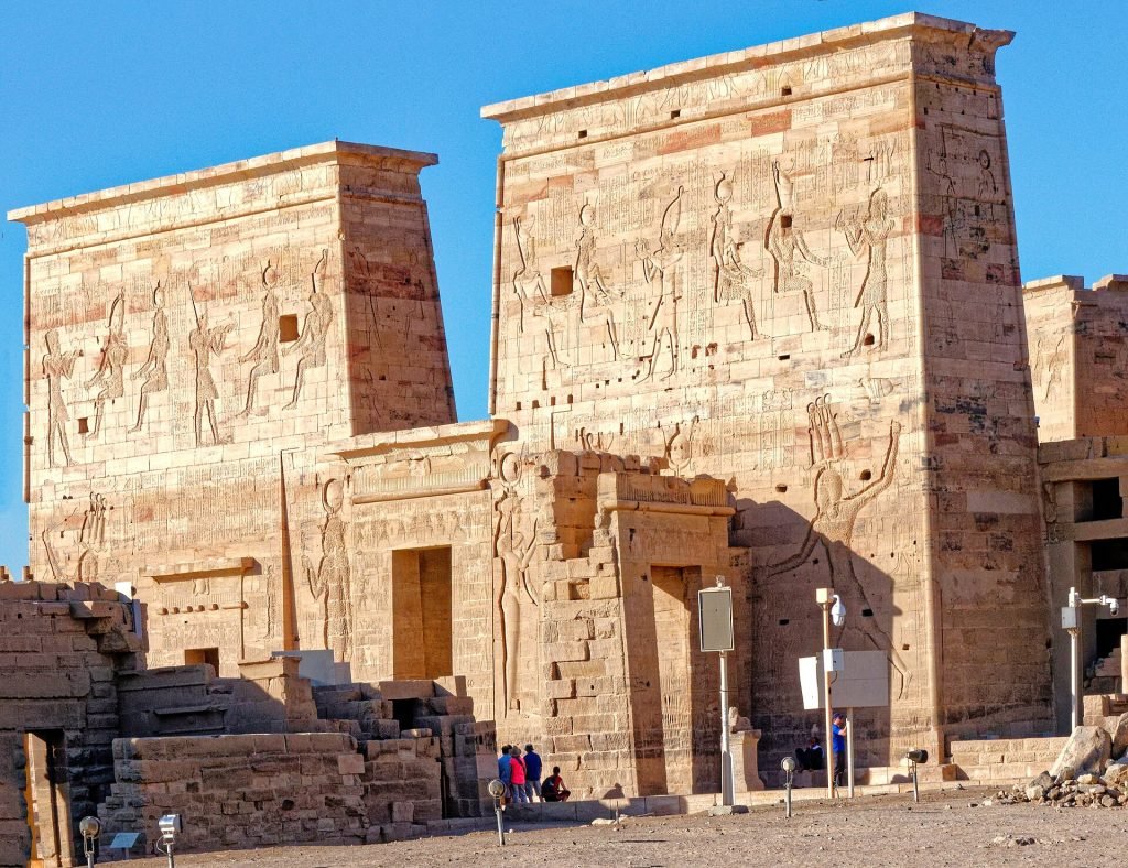 Stone pylons and carved reliefs at Philae Temple
